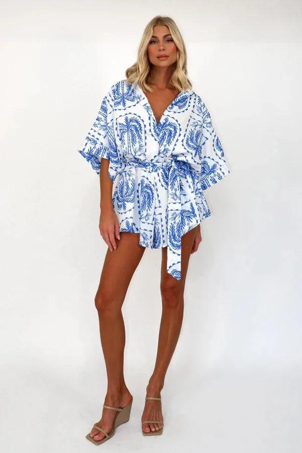 Blue & White V-neck Wrap Jumpsuit Striped wide leg jumpsuit, Relaxed fit, Comfortable, Fashionable Blue & White V-neck Wrap Jumpsuit Striped wide leg jumpsuit, Relaxed fit, Comfortable, Fashionable